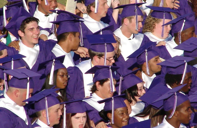 "Graduation" by schwglr is licensed under CC BY-SA 2.0. To view a copy of this license, visit https://creativecommons.org/licenses/by-sa/2.0/?ref=openverse.